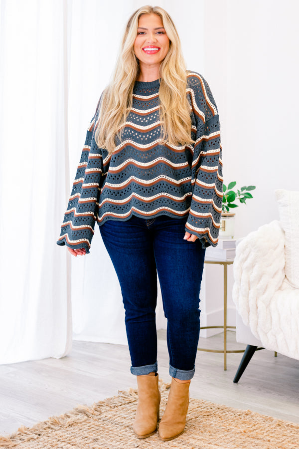 Chic Soul plus size clothing, navy long sleeve sweater with brown and white wavey stripes going across the sweater 