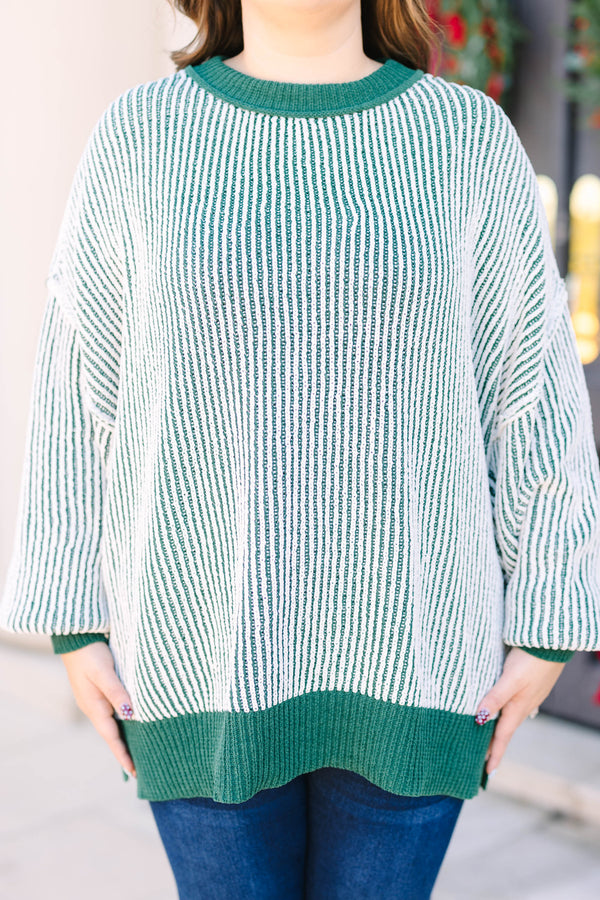Plus Size emerald and white vertical striped knit sweater with solid green ribbed trim.