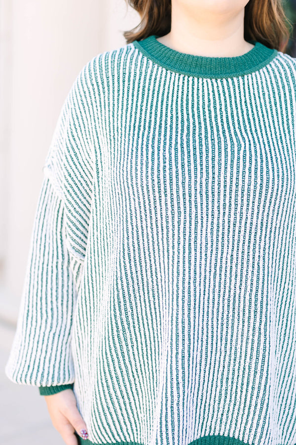 Plus Size emerald and white vertical striped knit sweater with solid green ribbed trim.