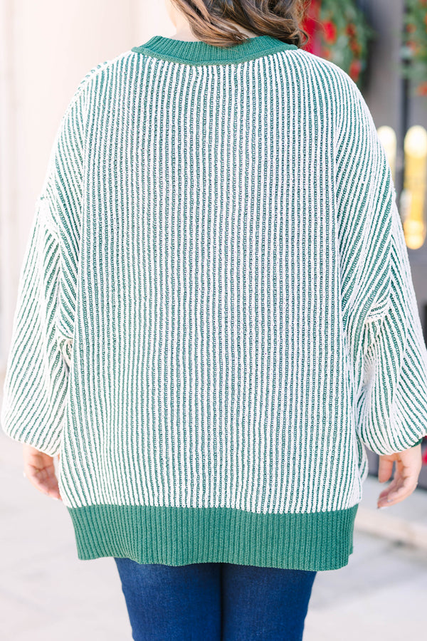 Plus Size emerald and white vertical striped knit sweater with solid green ribbed trim.