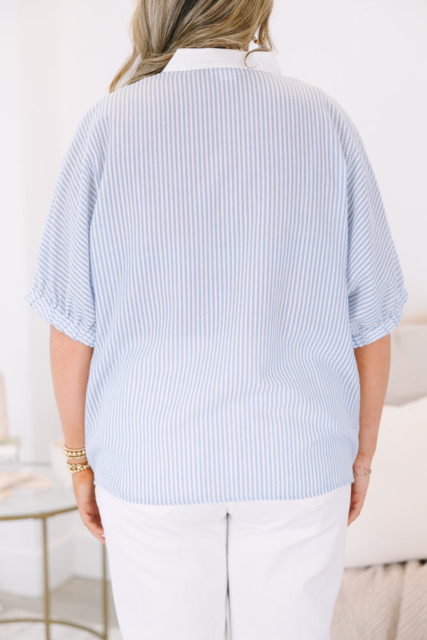 Plus Size blue and white vertical striped top with a white V-neckline and short sleeves.