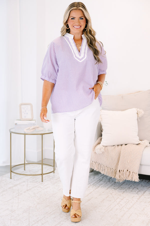 Plus Size lavender and white vertical striped top with a white V-neckline and short puff sleeves.