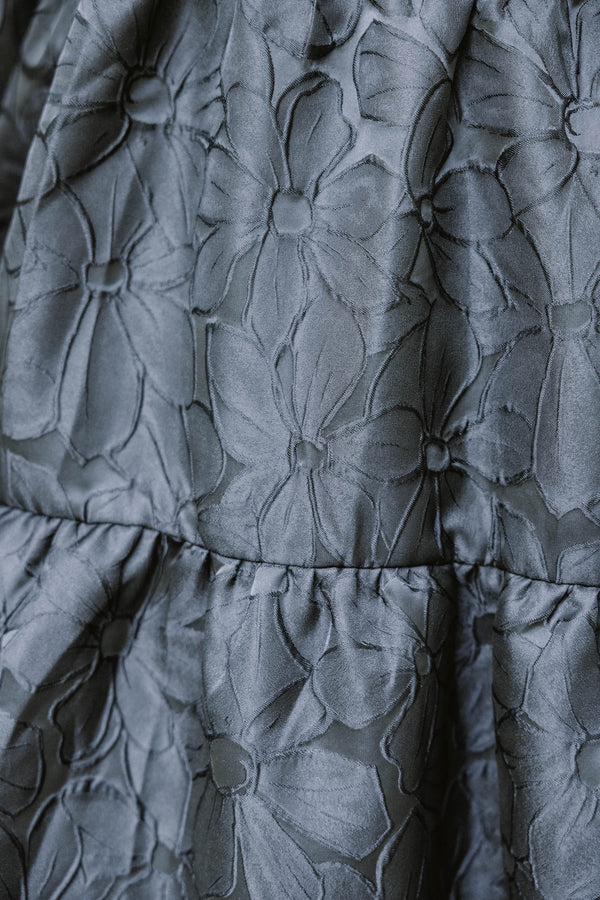 Chic Soul plus size clothing, black short puff sleeve tiered baby doll dress with v neck cutout and embossed floral print