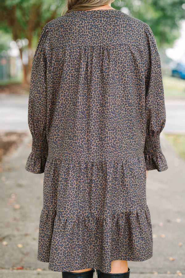 Plus Size dark leopard print tiered dress with a V-neckline and three-quarter length ruffled sleeves.