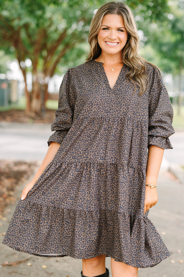 Plus Size dark leopard print tiered dress with a V-neckline and three-quarter length ruffled sleeves.