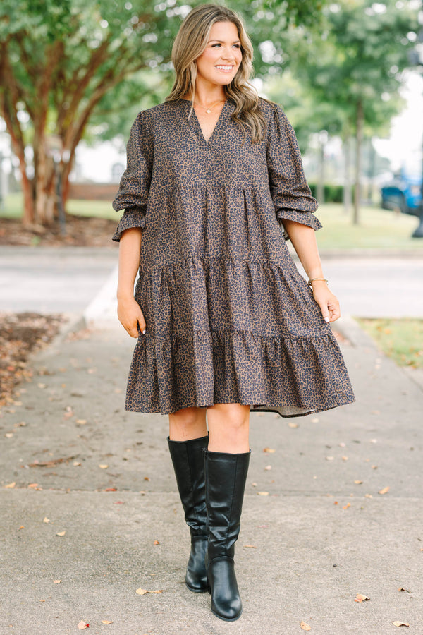 Plus Size dark leopard print tiered dress with a V-neckline and three-quarter length ruffled sleeves.