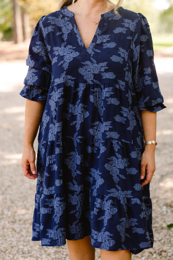 Chic Soul plus size clothing, navy blue short sleeve tiered knee length dress with v neckline and lighter blue floral print 