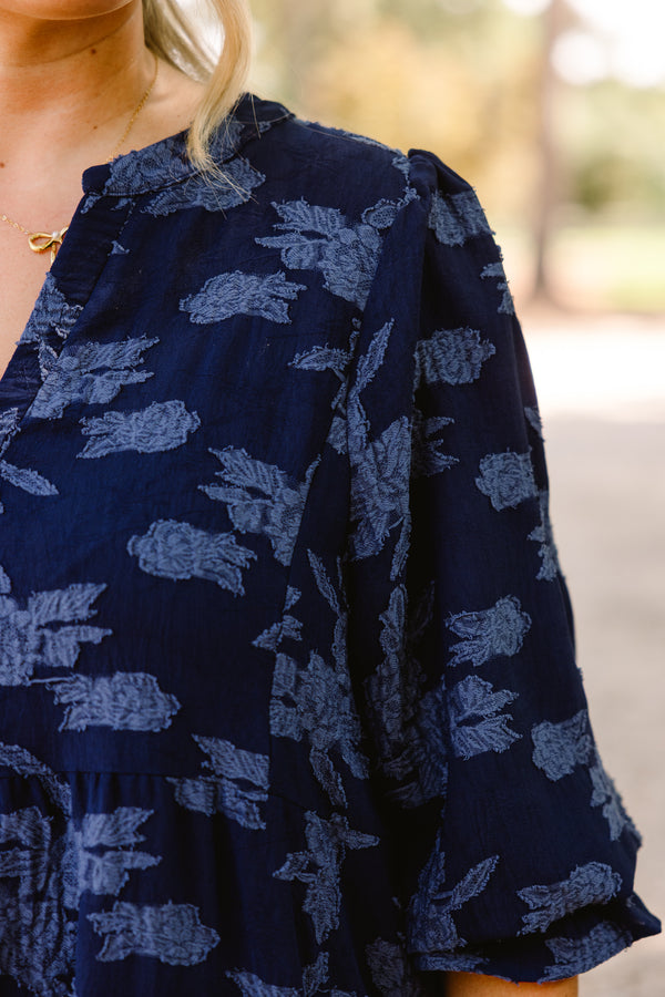 Chic Soul plus size clothing, navy blue short sleeve tiered knee length dress with v neckline and lighter blue floral print 