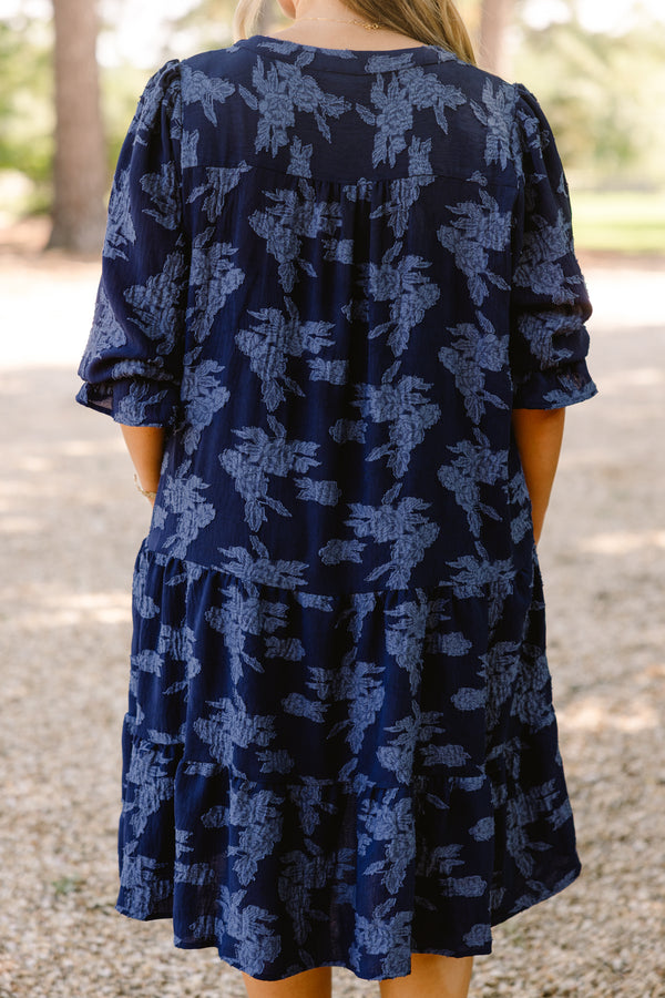 Chic Soul plus size clothing, navy blue short sleeve tiered knee length dress with v neckline and lighter blue floral print 