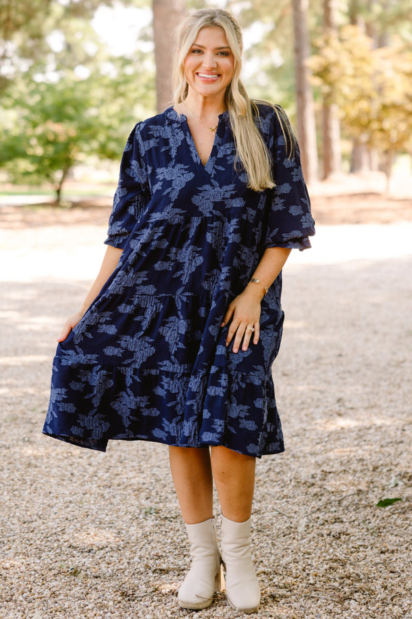 Chic Soul plus size clothing, navy blue short sleeve tiered knee length dress with v neckline and lighter blue floral print 