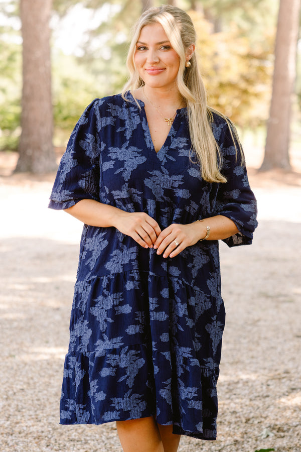 Chic Soul plus size clothing, navy blue short sleeve tiered knee length dress with v neckline and lighter blue floral print 
