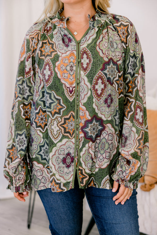 Chic Soul plus size clothing, olive green button up long sleeve blouse with cinched sleeves and a collar with abstract maroon and orange patterning. 