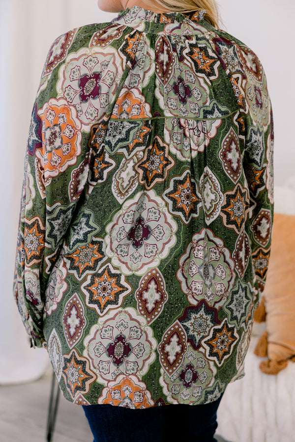 Chic Soul plus size clothing, olive green button up long sleeve blouse with cinched sleeves and a collar with abstract maroon and orange patterning. 