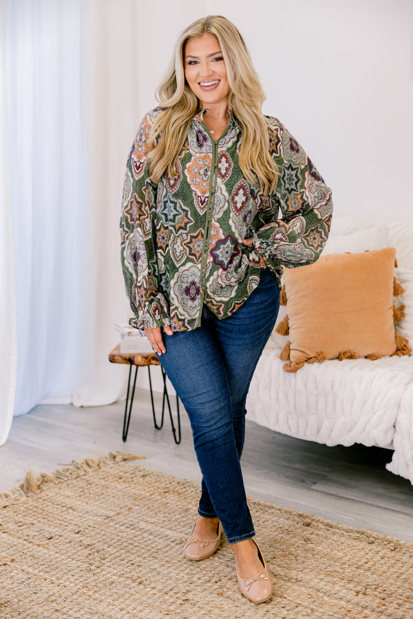 Chic Soul plus size clothing, olive green button up long sleeve blouse with cinched sleeves and a collar with abstract maroon and orange patterning. 