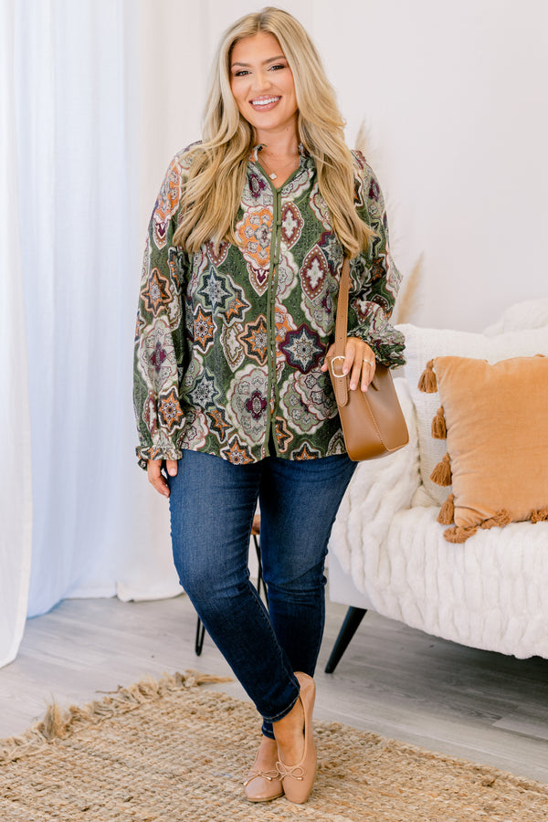 Chic Soul plus size clothing, olive green button up long sleeve blouse with cinched sleeves and a collar with abstract maroon and orange patterning. 