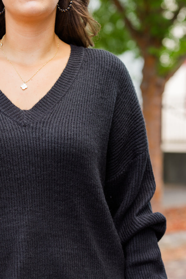 Chic Soul plus size clothing, black long sleeve knit sweater with v neckline and fringe detail along the bottom 