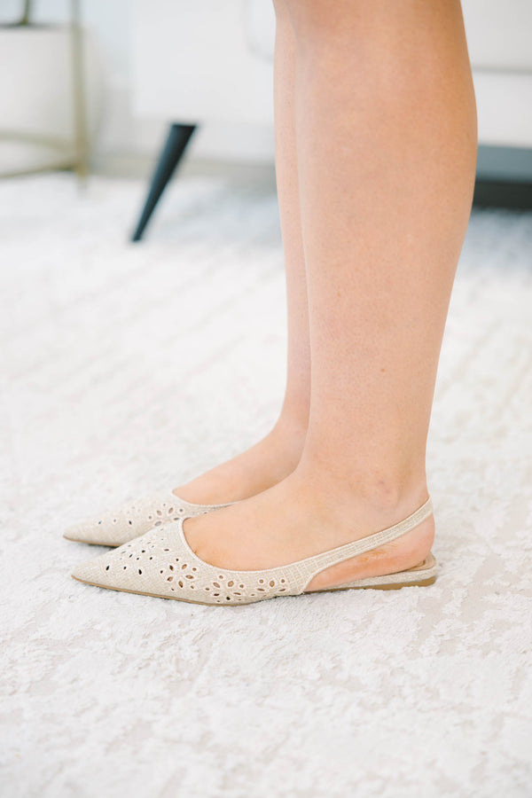 Natural pointed-toe slingback flats with delicate eyelet embroidery and a comfortable low heel
