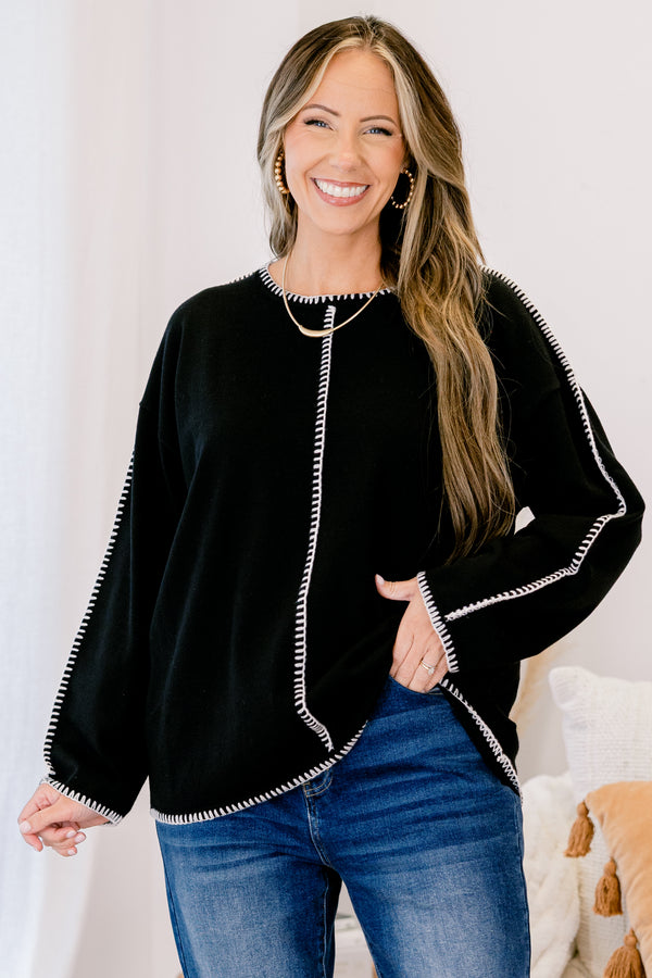 Chic Soul plus size clothing, black sweater with white stitching detailing along the hem, sleeves, and down the midline 