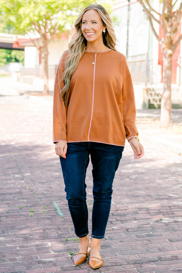 Chic Soul plus size clothing, brown long sleeve sweater with white stitching details going down the center of the sweater sleeves neckline ad bottom of the sweater 