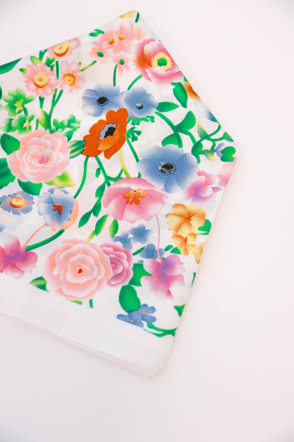 Plus Size white scarf featuring a vibrant pink, blue, and orange wildflower floral pattern.
