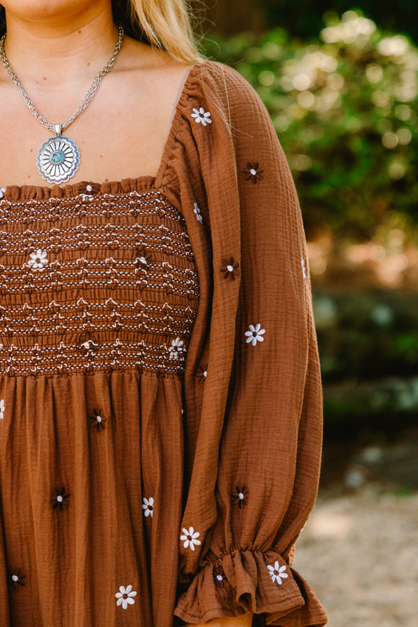 Chic Soul plus size clothing, dark brown maxi dress with a brown and white floral pattern and long bubble sleeves that have a ruffle detail as well as a square neckline 