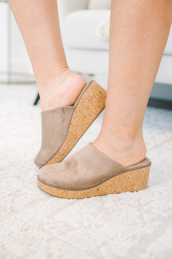Plus Size taupe suede wedge mules with a cork platform and closed round toe.