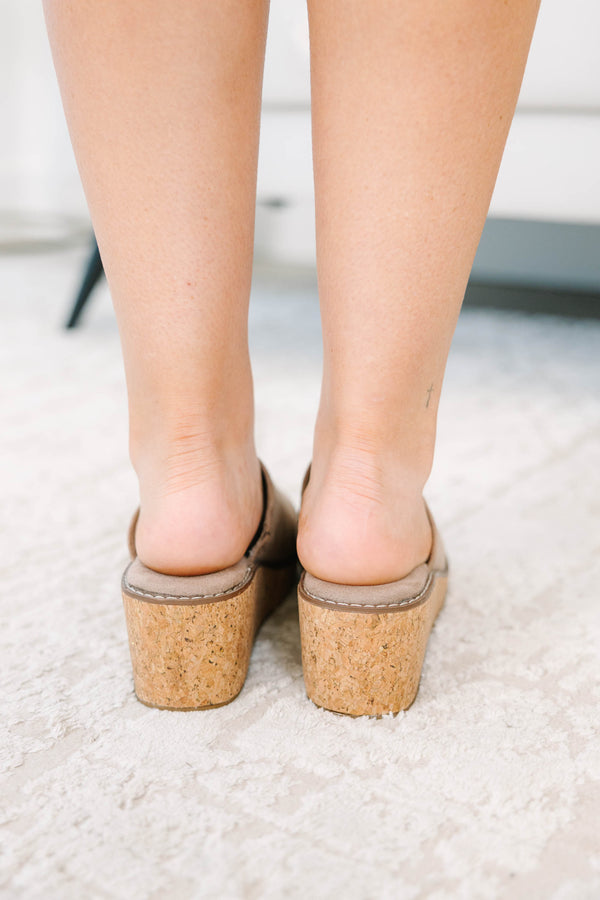Plus Size taupe suede wedge mules with a cork platform and closed round toe.