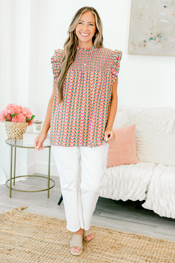Chic Soul plus size clothing, sleeveless rust orange top with smocked high neckline and geometric pattern with ruffled sleeves