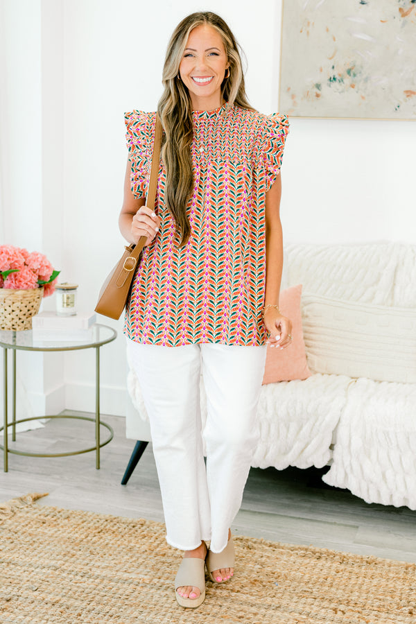 Chic Soul plus size clothing, sleeveless rust orange top with smocked high neckline and geometric pattern with ruffled sleeves