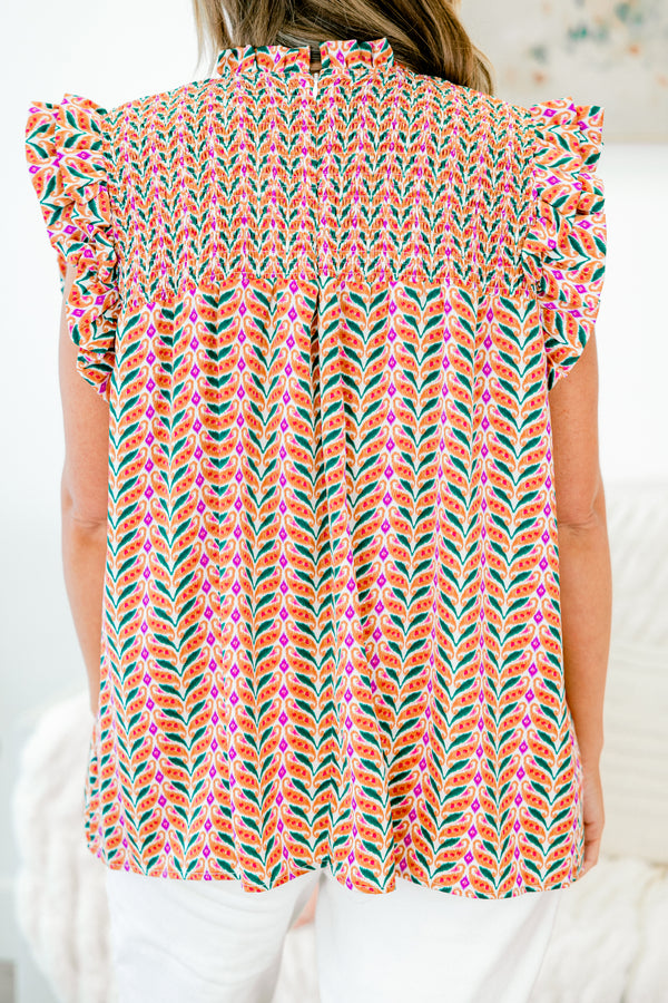 Chic Soul plus size clothing, sleeveless rust orange top with smocked high neckline and geometric pattern with ruffled sleeves