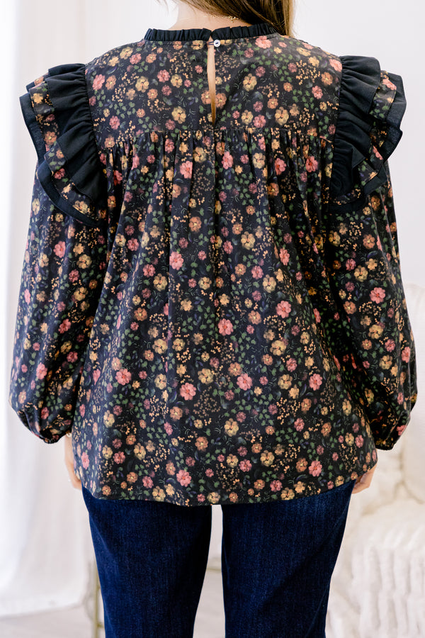 Chic Soul plus size clothing, black long sleeve top with ditsy yellow and pink floral pattern and black trim ruffle at the shoulders