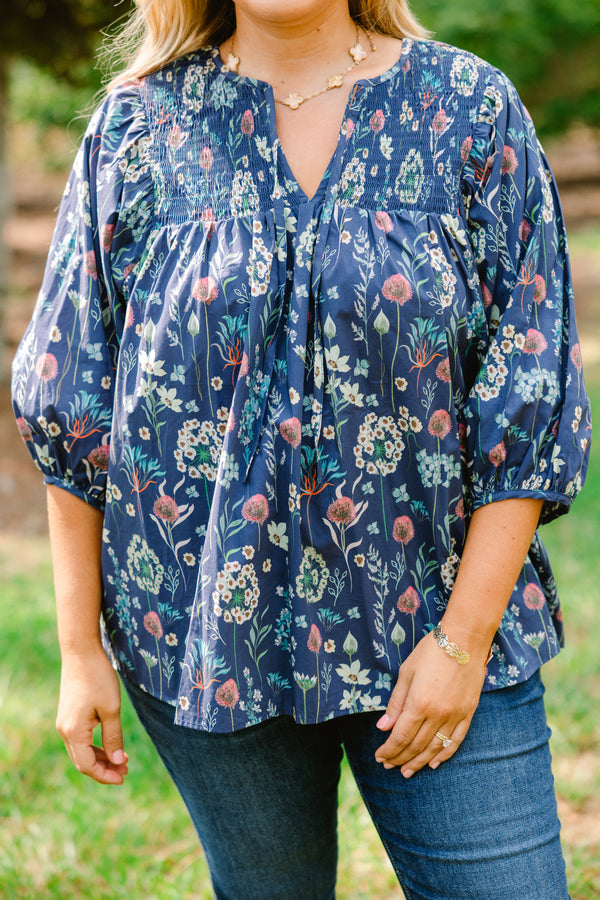 Chic Soul plus size clothing, dusty blue top with bubble sleeves and a floral pattern throughout 