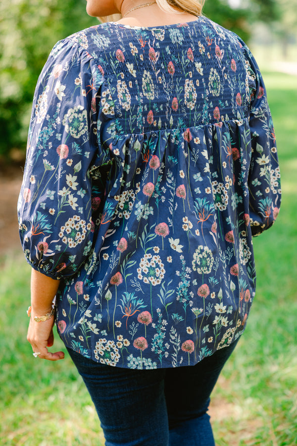 Chic Soul plus size clothing, dusty blue top with bubble sleeves and a floral pattern throughout 
