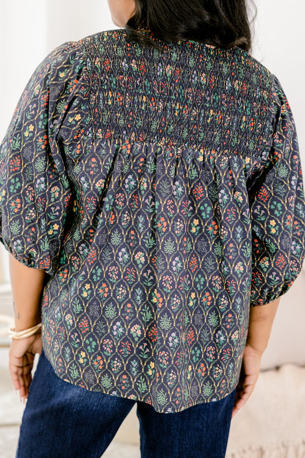 Chic Soul plus size clothing, navy and floral abstract pattern mid puff sleeve top with v-neckline and cinching at the end of the sleeves