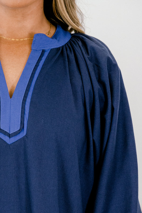 Chic Soul plus size clothing, navy long bubble sleeve short dress with light blue edges at the bottom of the dress and the sleeves and bordered the v-neckline 