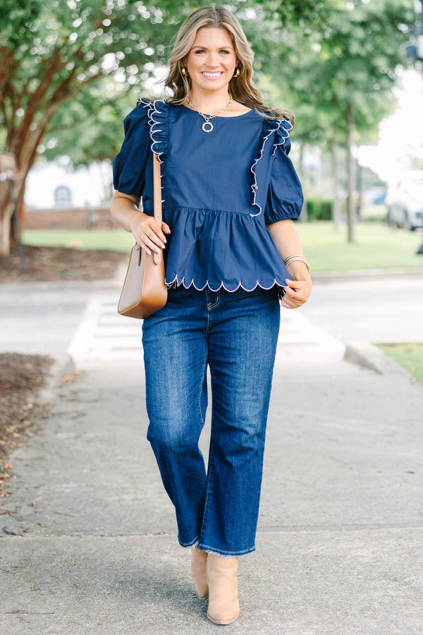 Plus size navy blue cotton Worth It Top with white scalloped ruffles and a flowy peplum silhouette.