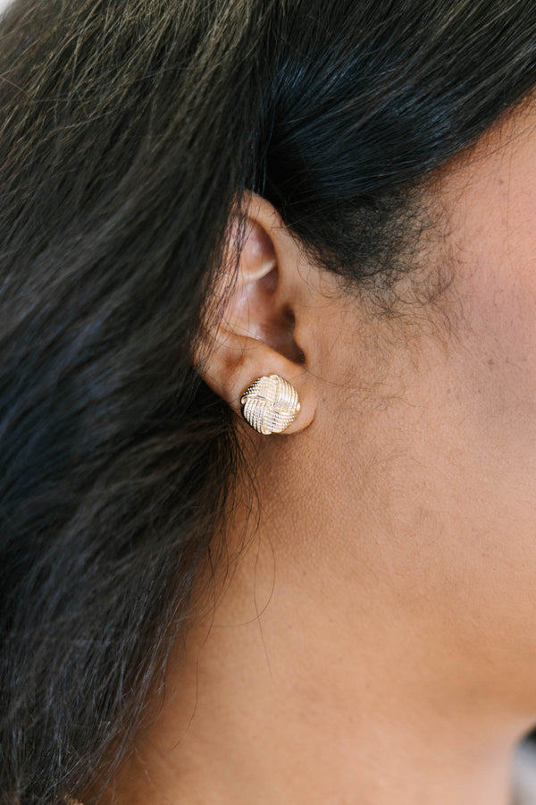 Plus Size gold stud earrings featuring a textured, woven knot design.