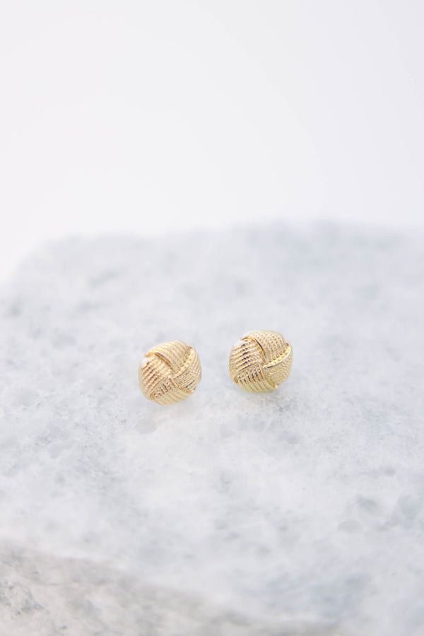 Plus Size gold stud earrings featuring a textured, woven knot design.