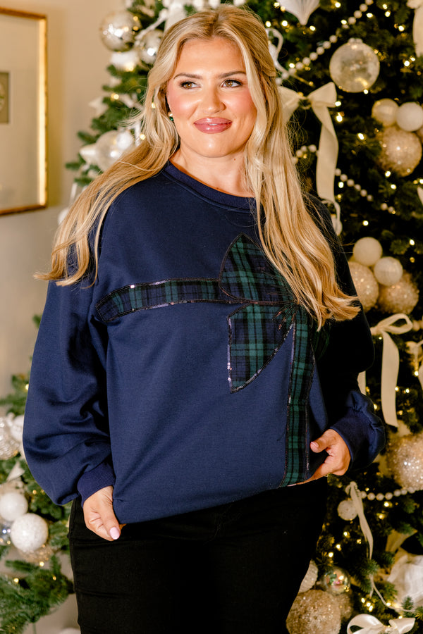 Chic Soul plus size clothing, navy blue long sleeve pullover with blue and green plaid bow wrapping the front