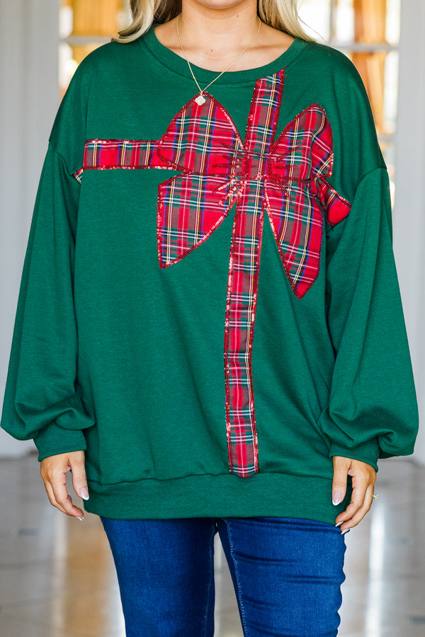 Chic Soul plus size clothing, green long sleeve pullover with red plaid ribbon and bow present wrapped graphic detail with cuffed bubble sleeves and round neckline
