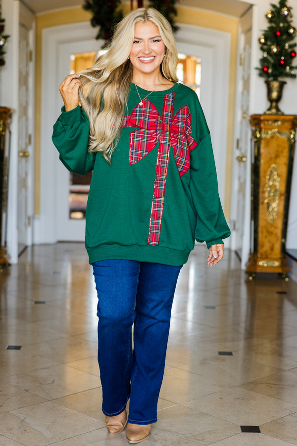 Chic Soul plus size clothing, green long sleeve pullover with red plaid ribbon and bow present wrapped graphic detail with cuffed bubble sleeves and round neckline
