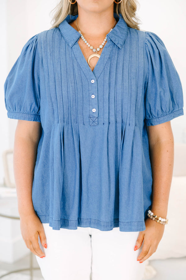 Plus Size denim top with short puff sleeves, a collared neckline, and pleated front details.