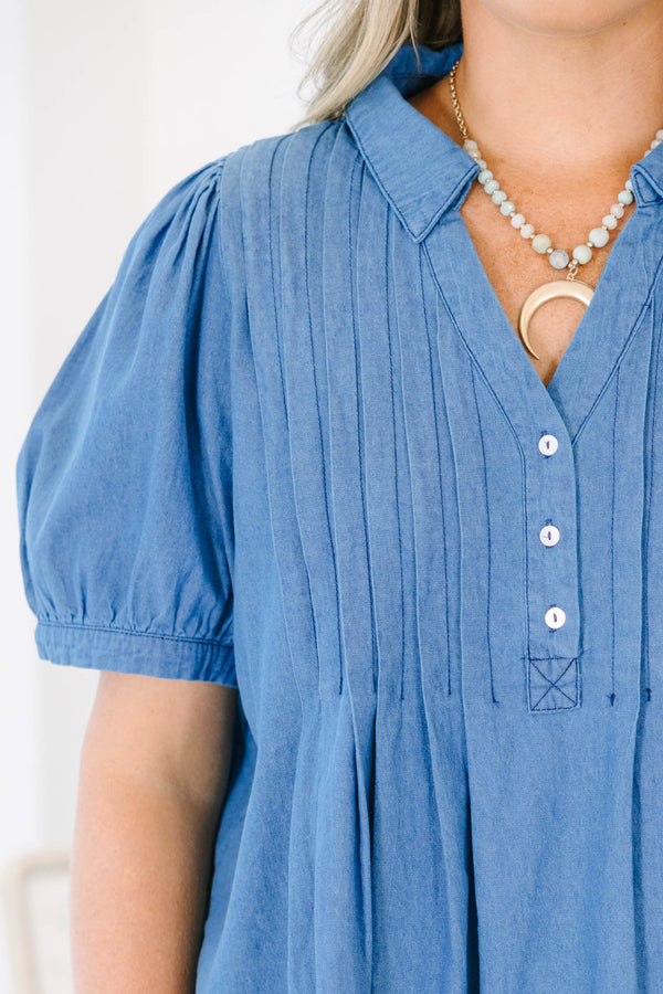 Plus Size denim top with short puff sleeves, a collared neckline, and pleated front details.