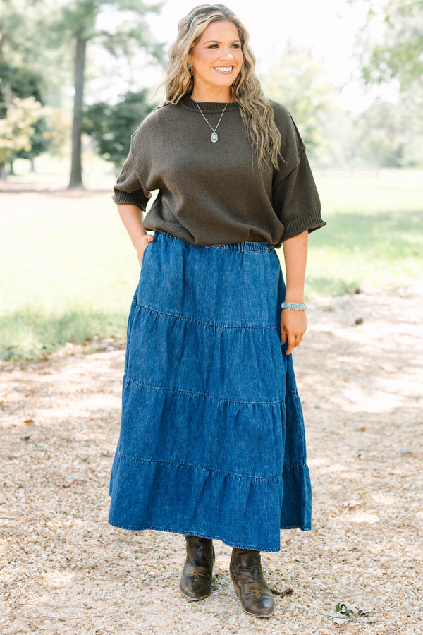 Plus size dark wash denim tiered maxi skirt with a comfortable elastic waist and flowy silhouette.