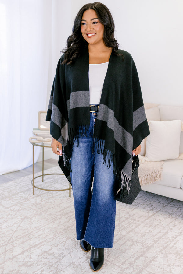 Chic Soul plus size clothing, black poncho sweater with thick grey horizontal stripe around the trim and fringe on the edge 
