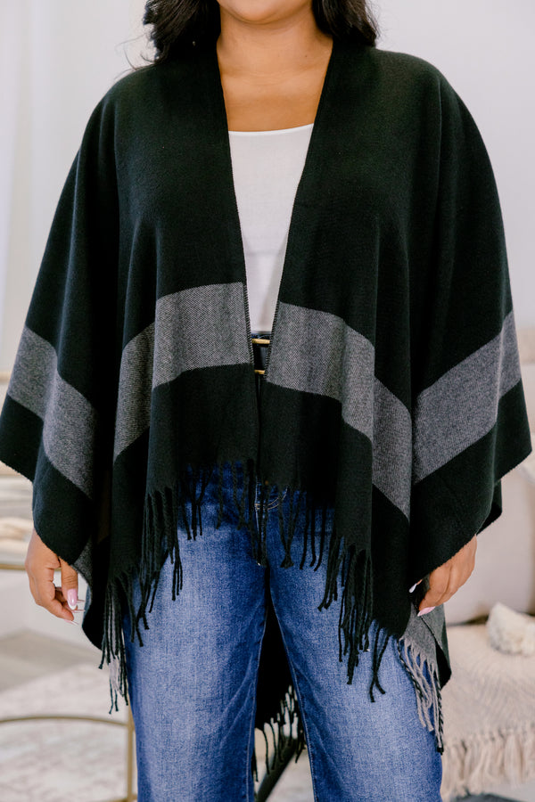 Chic Soul plus size clothing, black poncho sweater with thick grey horizontal stripe around the trim and fringe on the edge 
