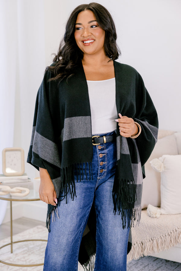Chic Soul plus size clothing, black poncho sweater with thick grey horizontal stripe around the trim and fringe on the edge 
