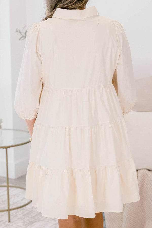Chic Soul plus size clothing, cream long sleeve short tiered baby doll dress with buttons 1/4 of the way down and a collar