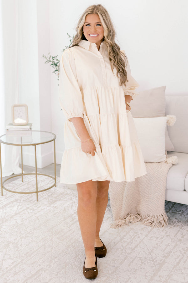 Chic Soul plus size clothing, cream long sleeve short tiered baby doll dress with buttons 1/4 of the way down and a collar