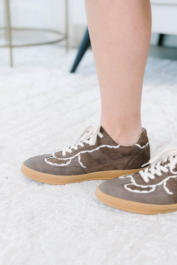 Plus size brown suede sneakers with white frayed trim, gum soles, and lace-up front.